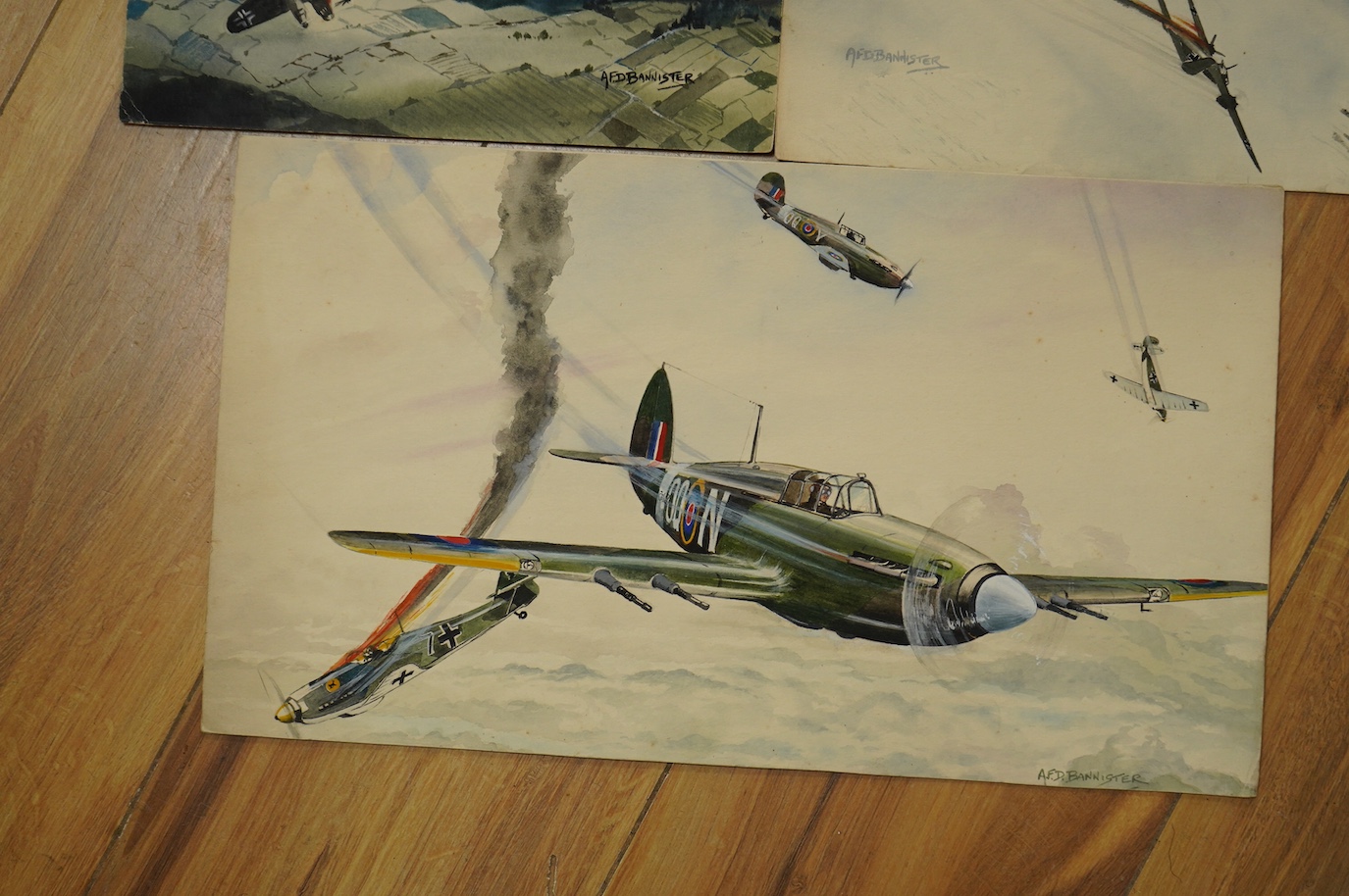 AFD Bannister, set of four original WWII watercolours for post card designs, RAF Aircraft to include ‘Hawker Hurricanes in combat’ and ‘The End of the Raider, Bristol Beaufighter downs a Heinkel III k’, each signed with